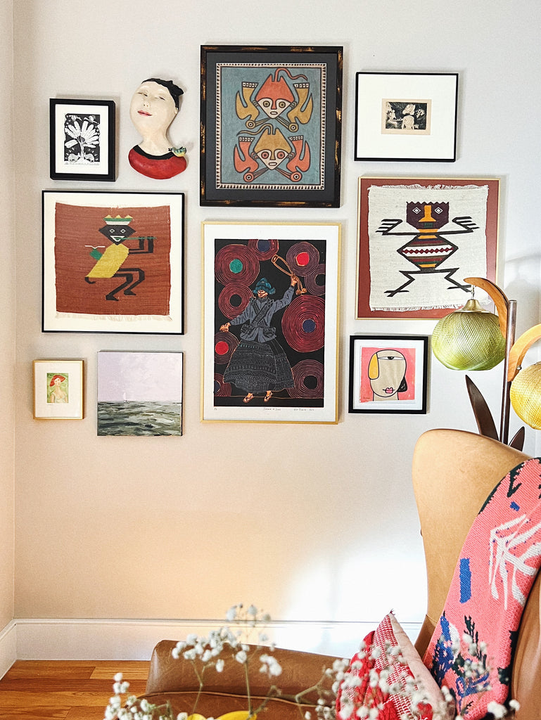 Eclectic travel inspired gallery wall